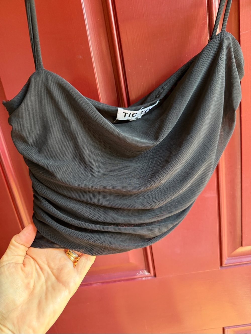 Tic Toc Black Draped Tube Top with Spaghetti Straps and touching on the sides